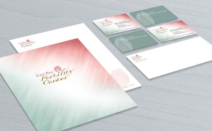 Logo and branding design for East Bay Fertility, displayed on stationery, business cards, and envelope